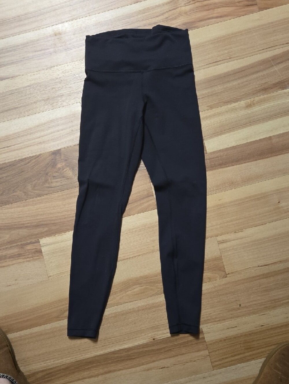 Black Lululemon Wonder Train Leggings - Picture 2 of 5